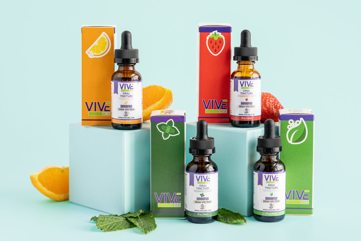 A serene arrangement of organic CBD products including tinctures, gummies, honey sticks, roll-ons, and bath bombs on a wooden surface, surrounded by hemp leaves and soft lighting.